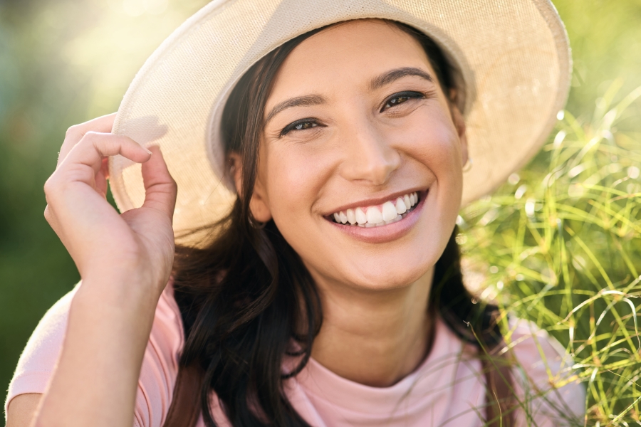 Portrait, woman and smile on countryside vacation, Canadian girl and weekend break. Face, female to.